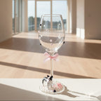 Glass with decorative elements on a white background
