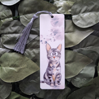 Bookmark with a cat illustration on a leafy background