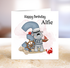 Birthday card with a cartoon hippo in a nautical theme.
