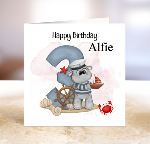 Birthday card with a cartoon hippo in a nautical theme.