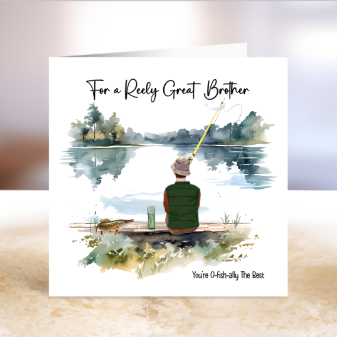 Greeting card with a person fishing on a lake, surrounded by nature, and text 'For a Reely Great Brother'.